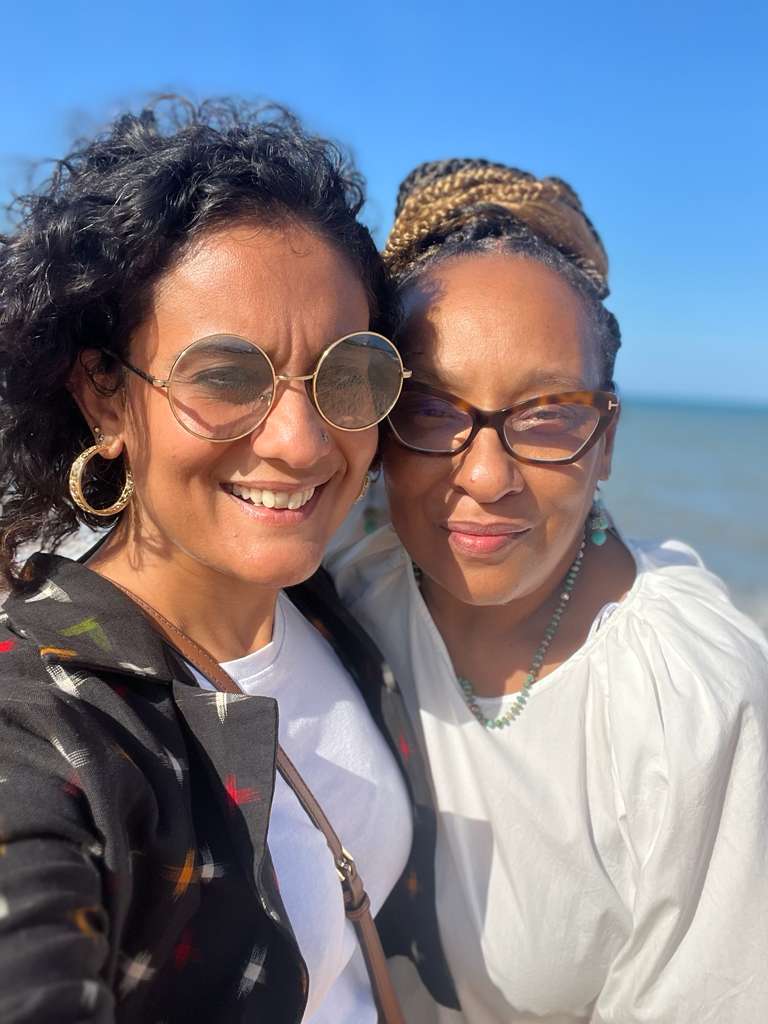 Tanvi Gandhi and Sabrina Aird together by the sea